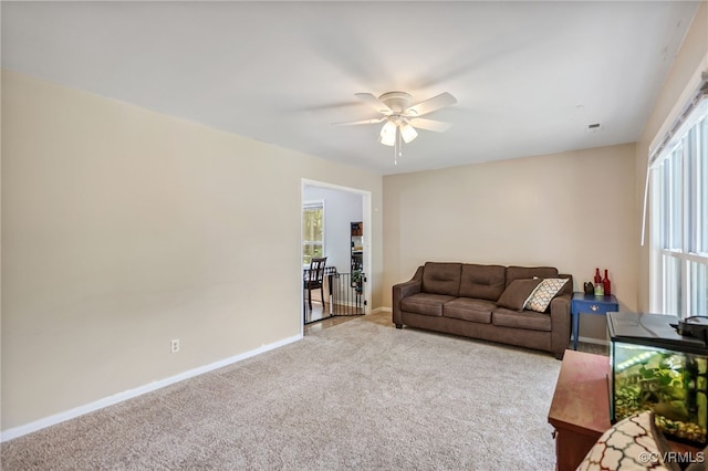 3309 Walnut Cove Ct, Chester, VA 23831 - carpeted living area with a ceiling fan and plenty of natural light