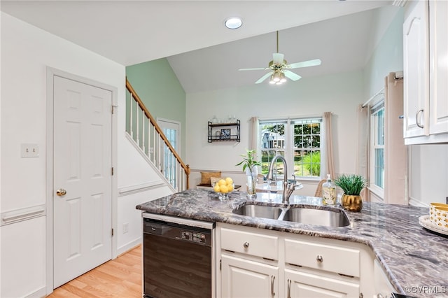1424 Laurel Top Dr, Midlothian, VA 23114 - kitchen with black dishwasher, light wood finished floors, dark stone countertops, a ceiling fan, and white cabinets