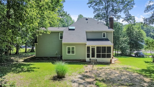1424 Laurel Top Dr, Midlothian, VA 23114 - back of house with a chimney, a sunroom, a lawn, and roof with shingles