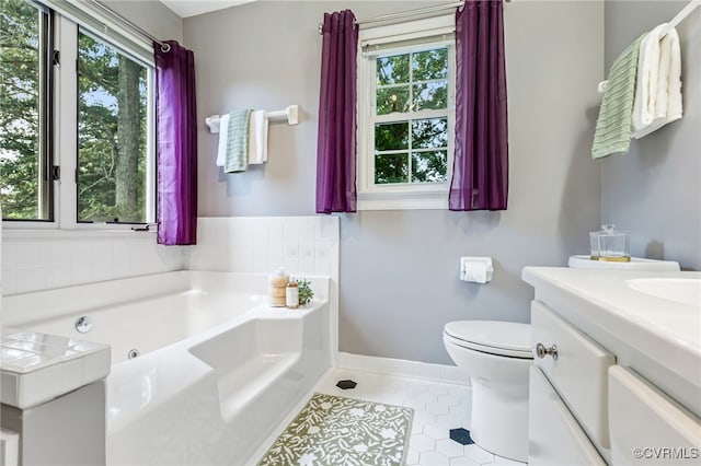 1424 Laurel Top Dr, Midlothian, VA 23114 - bathroom with plenty of natural light, a whirlpool tub, tile patterned floors, and vanity