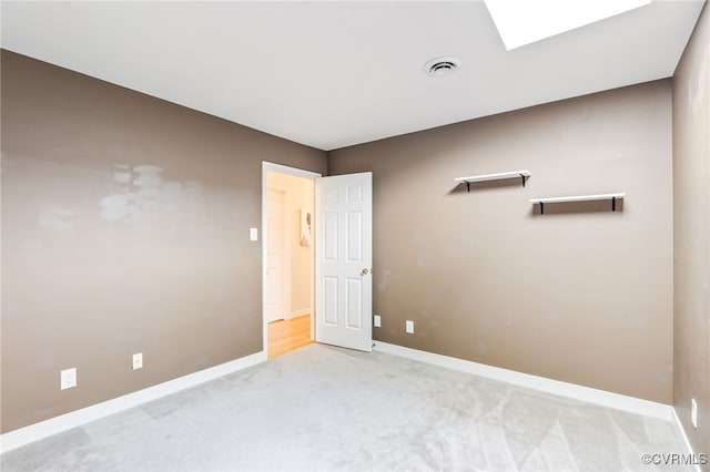 1424 Laurel Top Dr, Midlothian, VA 23114 - spare room featuring light carpet and a skylight