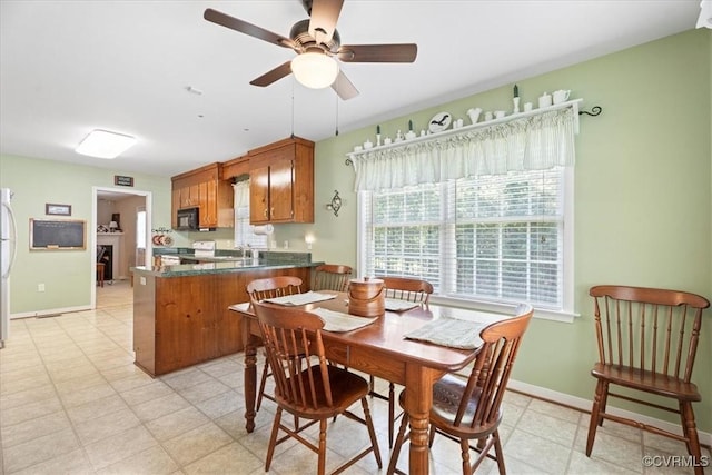 2551 Walkers Ridge Cir, Powhatan, VA 23139 - dining space with a ceiling fan and light flooring