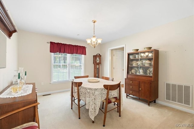 2551 Walkers Ridge Cir, Powhatan, VA 23139 - dining area with a chandelier and light colored carpet