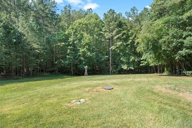 2551 Walkers Ridge Cir, Powhatan, VA 23139 - view of grassy yard featuring a view of trees