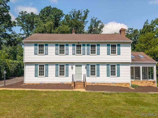 2340 Scarsborough Dr, North Chesterfield, VA 23235 - colonial house featuring a chimney, crawl space, a front yard, and a sunroom