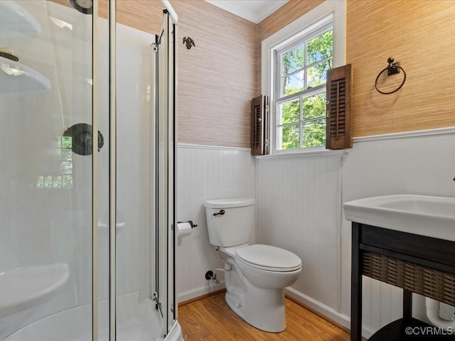 2340 Scarsborough Dr, North Chesterfield, VA 23235 - full bathroom with wainscoting, wood finished floors, a stall shower, vanity, and crown molding