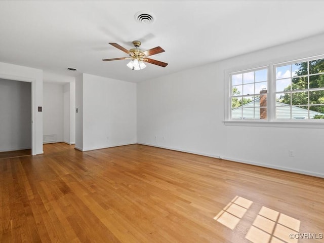 2340 Scarsborough Dr, North Chesterfield, VA 23235 - empty room with light wood-style flooring and ceiling fan