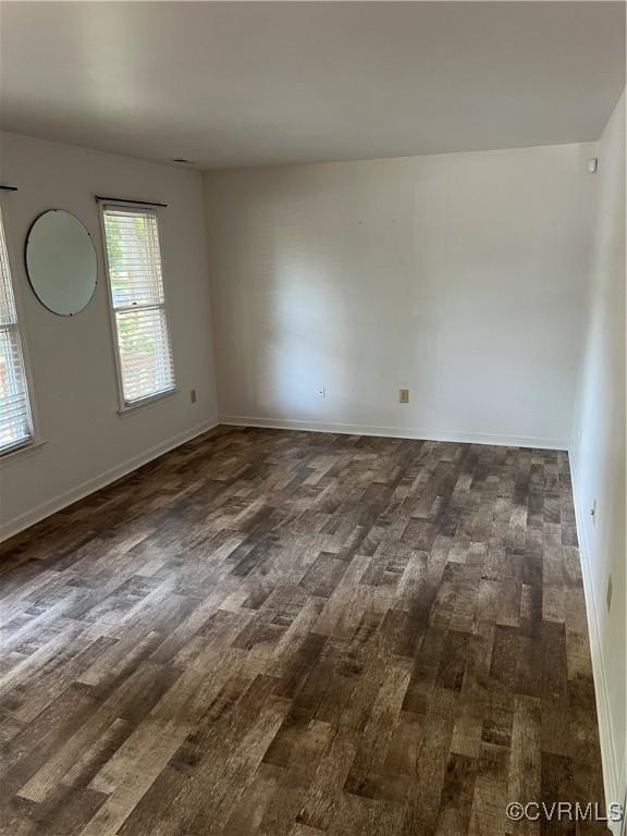10904 Robin Spring Ln, Glen Allen, VA 23060 - empty room with dark wood-type flooring and baseboards