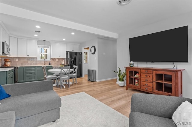 611 Queensway Rd, North Chesterfield, VA 23236 - living room with recessed lighting and light wood-style flooring