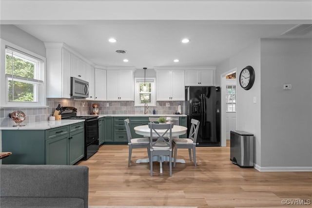 611 Queensway Rd, North Chesterfield, VA 23236 - kitchen with black appliances, green cabinetry, white cabinets, plenty of natural light, and recessed lighting
