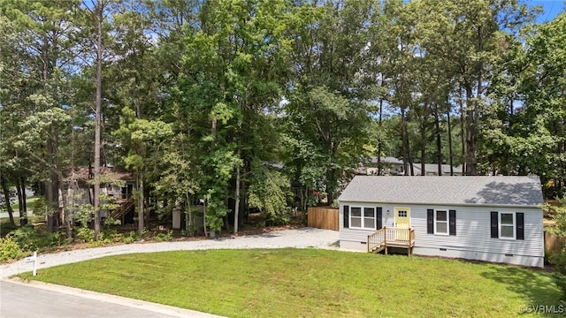 611 Queensway Rd, North Chesterfield, VA 23236 - view of front facade featuring crawl space, gravel driveway, view of scattered trees, and a shingled roof