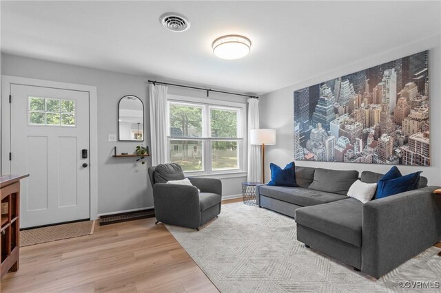 611 Queensway Rd, North Chesterfield, VA 23236 - living area featuring wood finished floors and healthy amount of natural light
