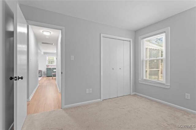 611 Queensway Rd, North Chesterfield, VA 23236 - unfurnished bedroom featuring light colored carpet and a closet