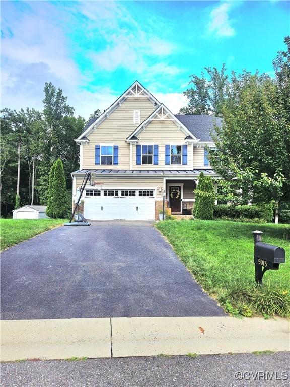 9013 Bailey Hill Rd, Chesterfield, VA 23112 - craftsman house with driveway, a garage, a front lawn, and a standing seam roof