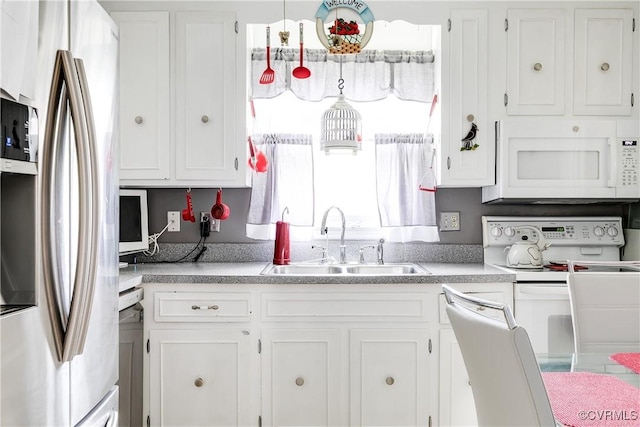 4601 Helena Cir, Petersburg, VA 23803 - kitchen featuring appliances with stainless steel finishes, white cabinets, and light countertops