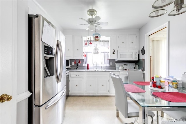 4601 Helena Cir, Petersburg, VA 23803 - kitchen featuring white appliances, a ceiling fan, white cabinets, light countertops, and light flooring