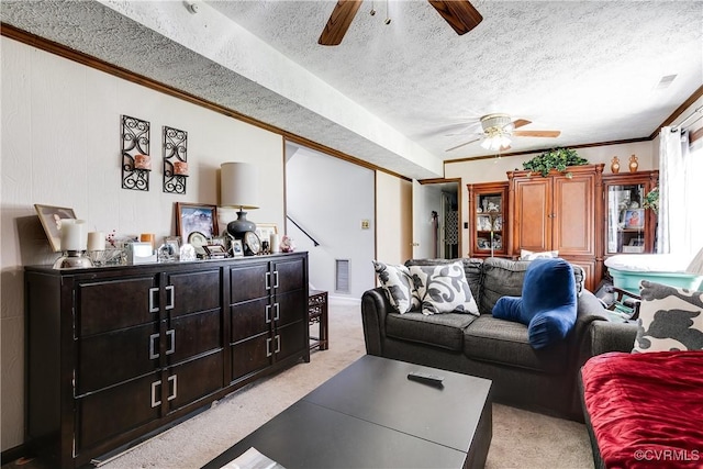 4601 Helena Cir, Petersburg, VA 23803 - living room featuring ceiling fan, light carpet, a textured ceiling, and ornamental molding