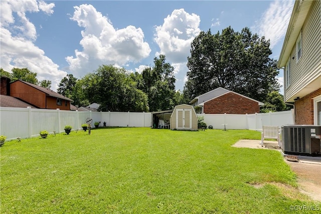 4601 Helena Cir, Petersburg, VA 23803 - fenced backyard with a storage shed and a patio area