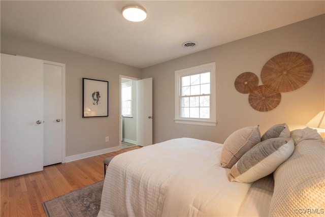1117 Penobscot Rd, Henrico, VA 23227 - bedroom with wood finished floors and baseboards