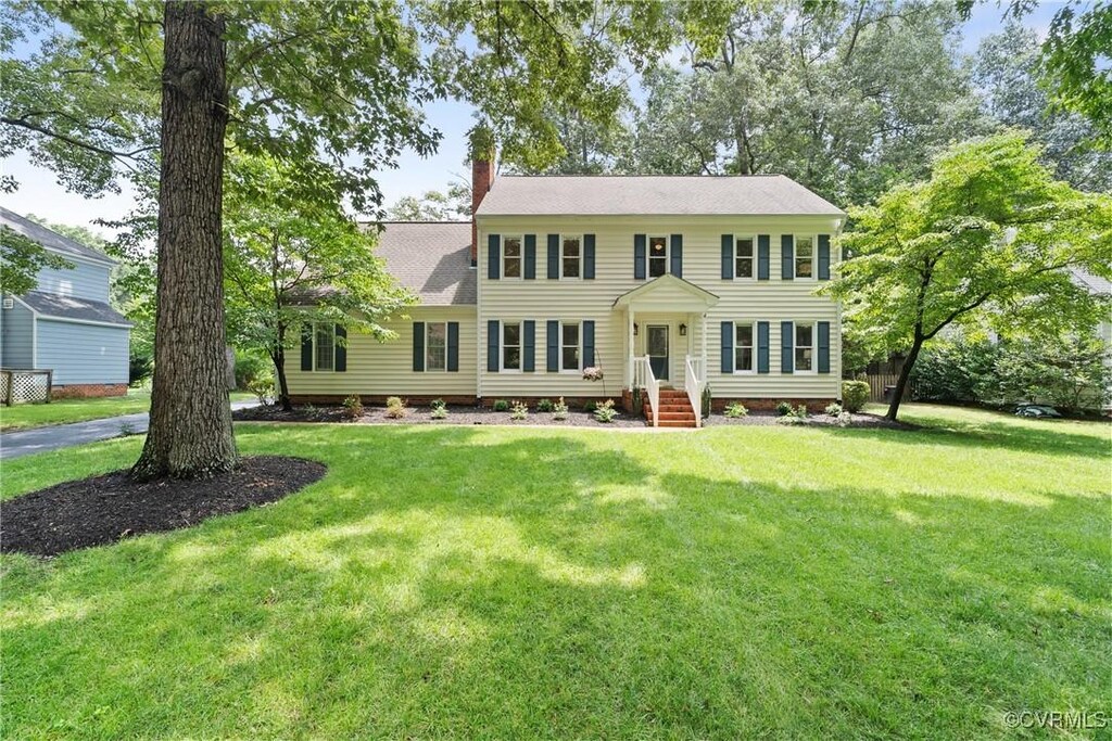 5311 Rock Harbour Rd, Chesterfield, VA 23112 - colonial-style house featuring a chimney and a front lawn