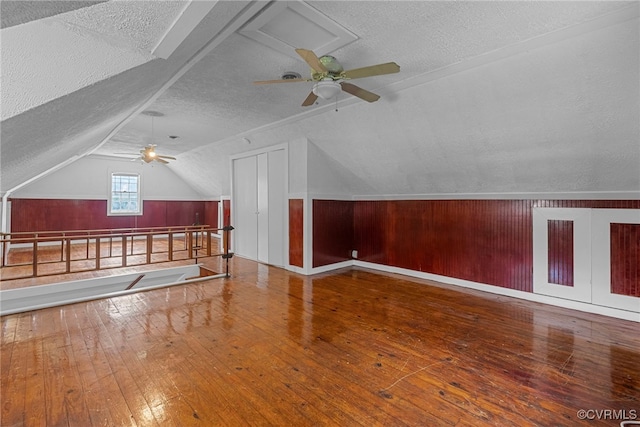 501 E Azalea Ave, Richmond, VA 23227 - additional living space featuring a textured ceiling, ceiling fan, lofted ceiling, and wood-type flooring