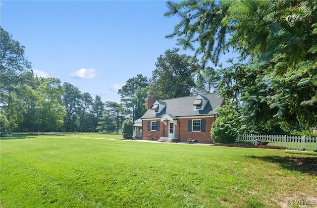 501 E Azalea Ave, Richmond, VA 23227 - cape cod home with brick siding and a chimney