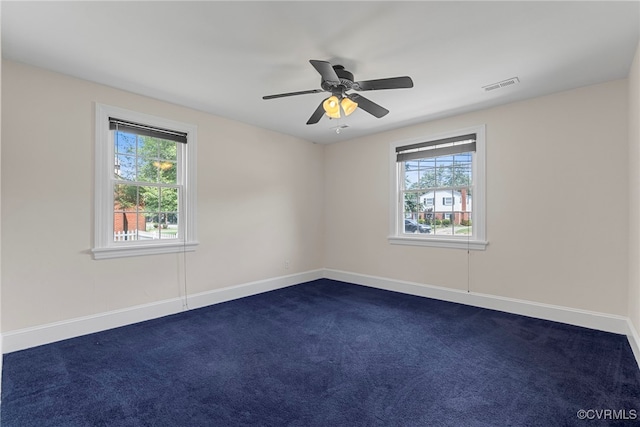 501 E Azalea Ave, Richmond, VA 23227 - empty room with healthy amount of natural light, dark carpet, and ceiling fan
