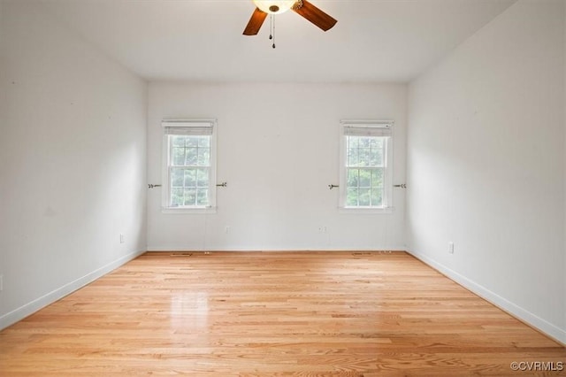 17220 Dawn Ct, Amelia Courthouse, VA 23002 - unfurnished room with plenty of natural light, a ceiling fan, and light wood-style floors