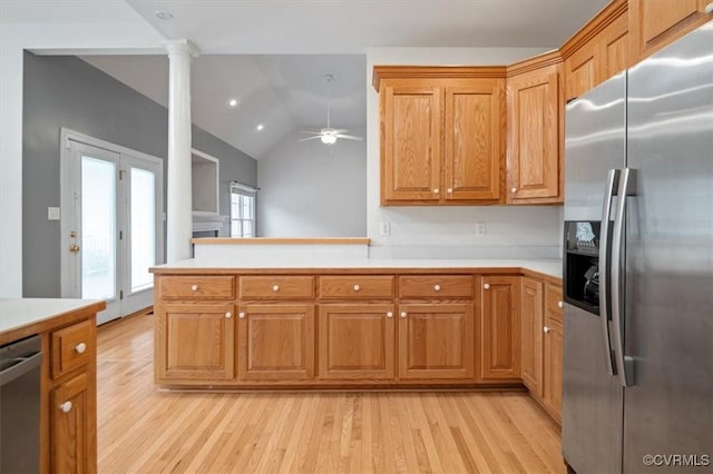 17220 Dawn Ct, Amelia Courthouse, VA 23002 - kitchen featuring stainless steel appliances, light wood-style flooring, decorative columns, light countertops, and a ceiling fan