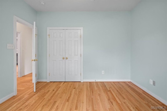 17220 Dawn Ct, Amelia Courthouse, VA 23002 - unfurnished bedroom featuring light wood-style flooring and a closet