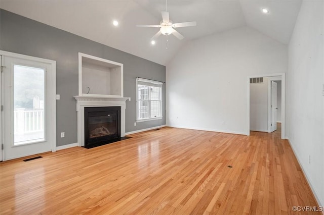 17220 Dawn Ct, Amelia Courthouse, VA 23002 - unfurnished living room with a fireplace with flush hearth, ceiling fan, light wood-style flooring, recessed lighting, and high vaulted ceiling