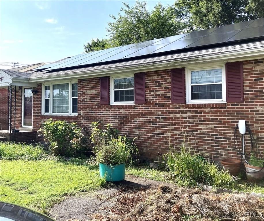 117 Wright Ave, Colonial Heights, VA 23834 - view of side of property featuring brick siding and solar panels
