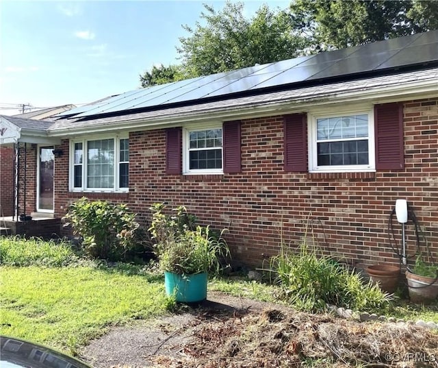 117 Wright Ave, Colonial Heights, VA 23834 - view of side of property featuring brick siding and solar panels