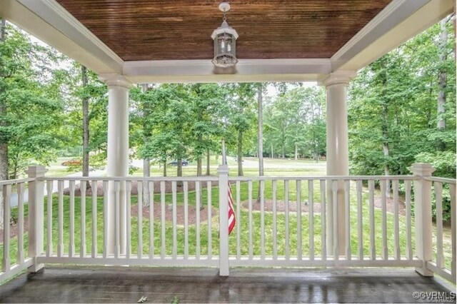 1638 Fallen Timber Trl, Powhatan, VA 23139 - porch featuring a yard and view of wooded area