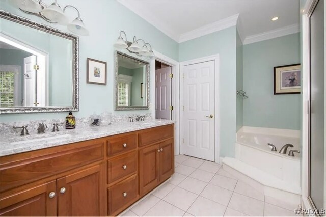 1638 Fallen Timber Trl, Powhatan, VA 23139 - bathroom featuring double vanity, tile patterned flooring, a garden tub, and ornamental molding