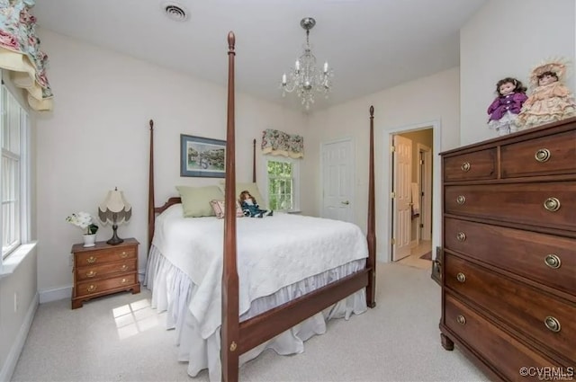 1638 Fallen Timber Trl, Powhatan, VA 23139 - bedroom featuring a chandelier, light carpet, and multiple windows