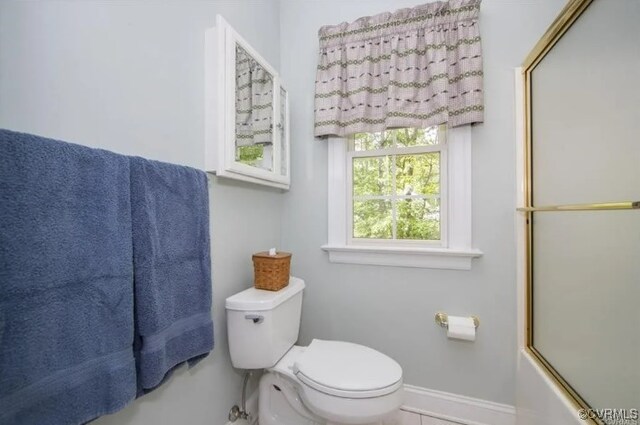 1638 Fallen Timber Trl, Powhatan, VA 23139 - bathroom featuring toilet and shower / bath combination with glass door