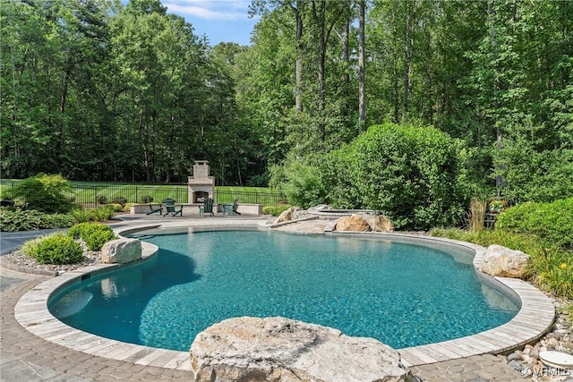 923 Merchant Lee Pl, Manakin Sabot, VA 23103 - view of swimming pool with an outdoor fireplace and a patio