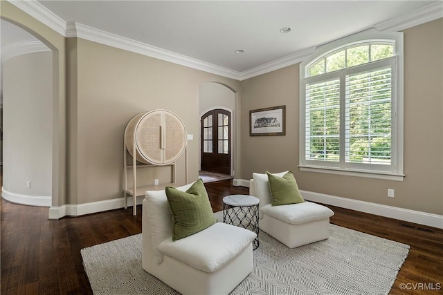 923 Merchant Lee Pl, Manakin Sabot, VA 23103 - living area with arched walkways, crown molding, healthy amount of natural light, wood finished floors, and recessed lighting