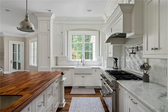 923 Merchant Lee Pl, Manakin Sabot, VA 23103 - kitchen with double oven range, wooden counters, ornamental molding, decorative backsplash, and dark wood finished floors