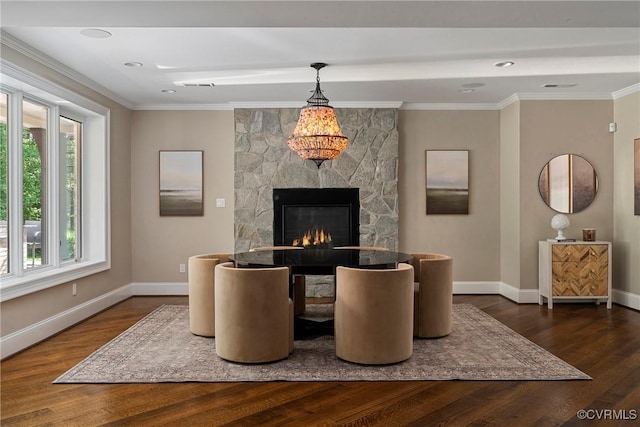 923 Merchant Lee Pl, Manakin Sabot, VA 23103 - dining space featuring wood finished floors, a stone fireplace, ornamental molding, and recessed lighting