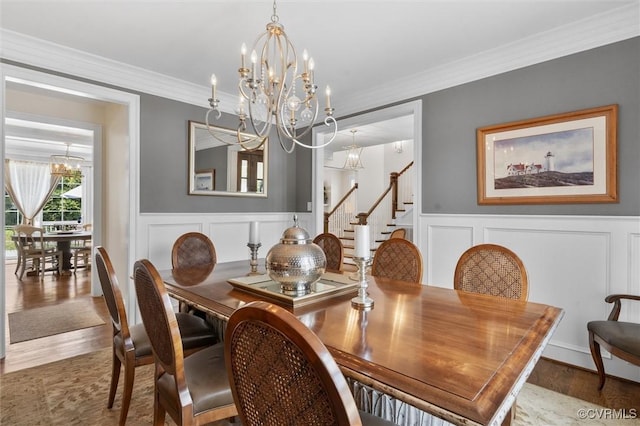 5154 Lake Summer Loop, Moseley, VA 23120 - dining room featuring a chandelier, a decorative wall, stairway, crown molding, and wainscoting