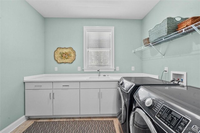 5154 Lake Summer Loop, Moseley, VA 23120 - laundry area with washer and dryer, light wood-type flooring, and cabinet space