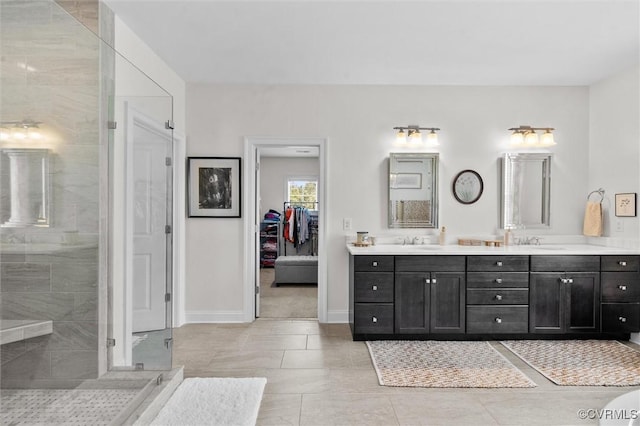5154 Lake Summer Loop, Moseley, VA 23120 - bathroom featuring double vanity, a stall shower, and a spacious closet