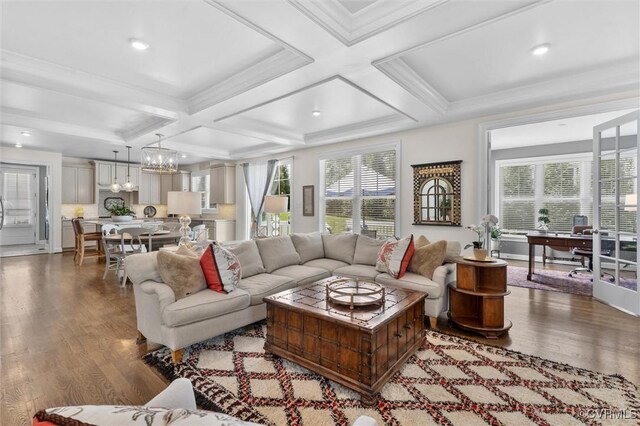 5154 Lake Summer Loop, Moseley, VA 23120 - living room featuring wood finished floors, a chandelier, coffered ceiling, healthy amount of natural light, and beam ceiling