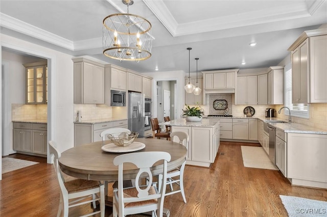 5154 Lake Summer Loop, Moseley, VA 23120 - kitchen featuring a raised ceiling, appliances with stainless steel finishes, tasteful backsplash, crown molding, and recessed lighting