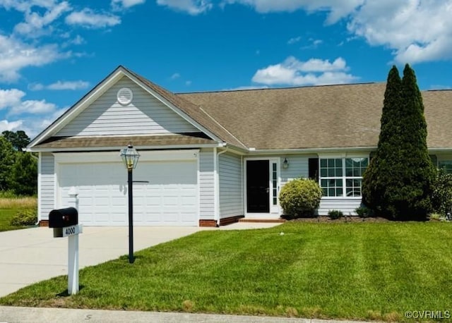 4000 Rotherham Cir, Prince George, VA 23875 - single story home with concrete driveway, a garage, a front yard, and roof with shingles