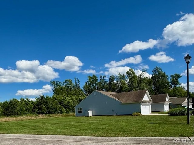 4000 Rotherham Cir, Prince George, VA 23875 - view of home's exterior featuring a lawn and a garage