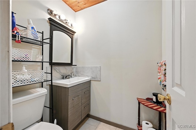 1593 Baxter Rd, Prince George, VA 23875 - half bath with vanity, tile patterned floors, tasteful backsplash, and wood ceiling