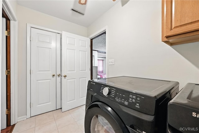 1593 Baxter Rd, Prince George, VA 23875 - washroom with cabinet space, washer and dryer, and light tile patterned floors